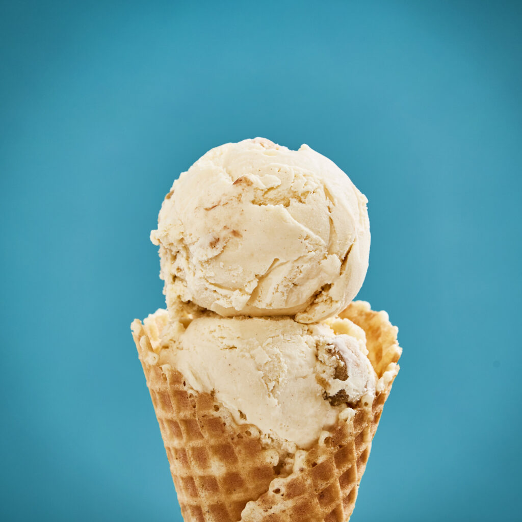 Peanut Butter cookie ice cream in a waffle cone