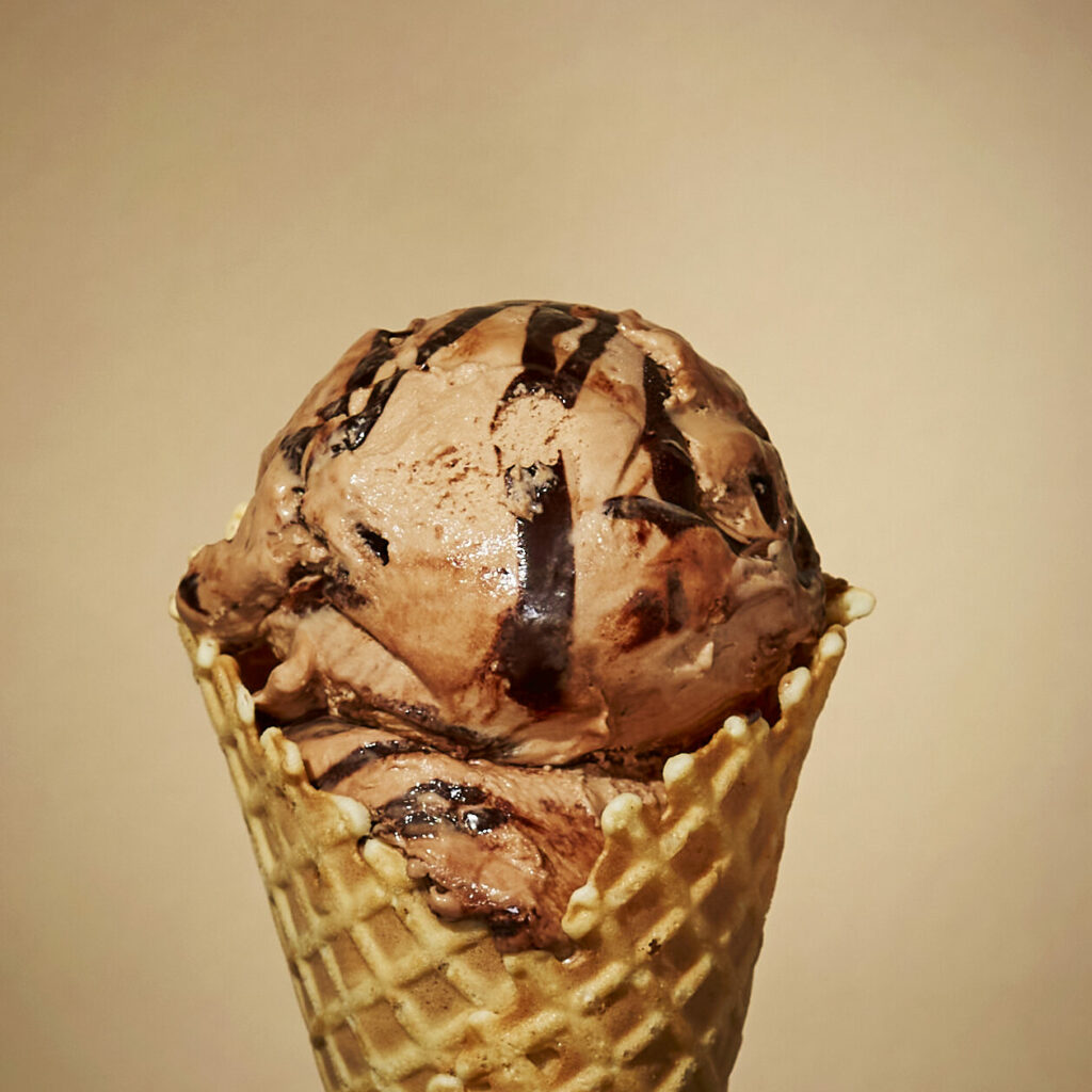 A waffle cone with Nutella ice cream scoops